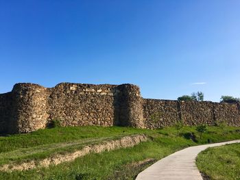 View of fort against blue sky