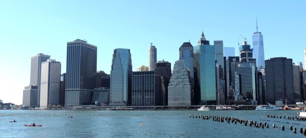 City lit up at waterfront