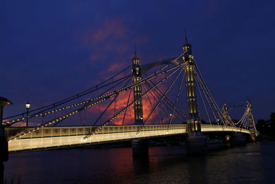  bridge over river against sky at night