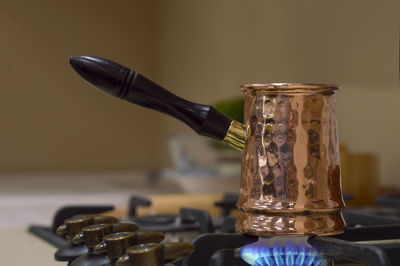 Close-up of glass jar on table