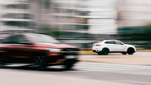 Blurred motion of car on road