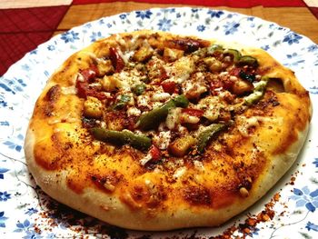 High angle view of pizza on table