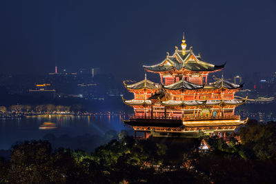 Illuminated historic building in city at night