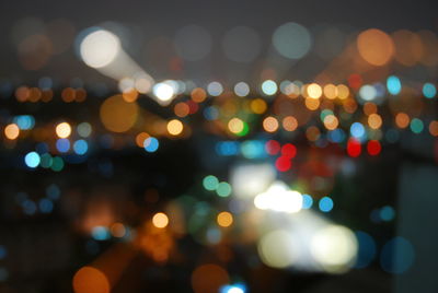 Defocused image of illuminated lights at night