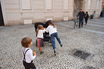People on street in city