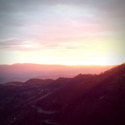 Scenic view of landscape against sky during sunset