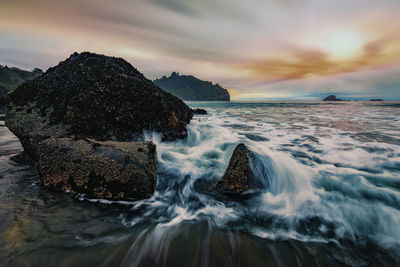 Scenic view of sea against sky during sunset