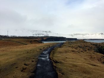 Scenic view of land against sky