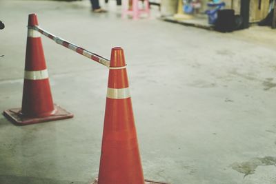 Close-up of red equipment on road