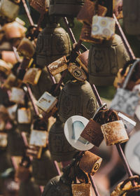 Close-up of padlocks hanging on metal