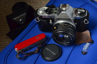 Close-up of camera on table