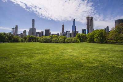 Panoramic view of city buildings against sky