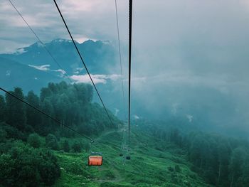 Overhead cable car over mountains