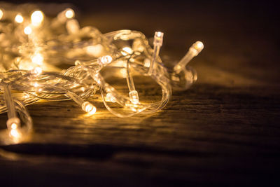 Close-up of illuminated string lights on table