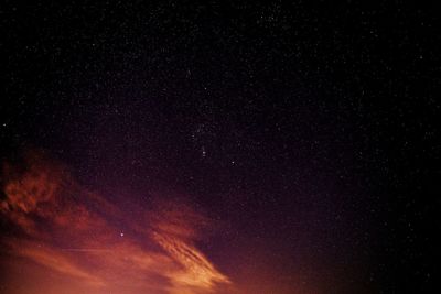 Low angle view of stars against sky at night