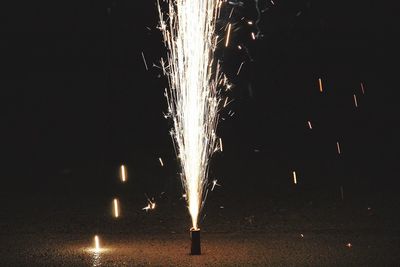 Firework display at night