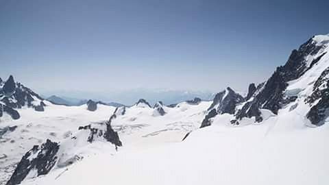 Scenic view of snow covered mountains