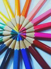High angle view of multi colored pencils on table