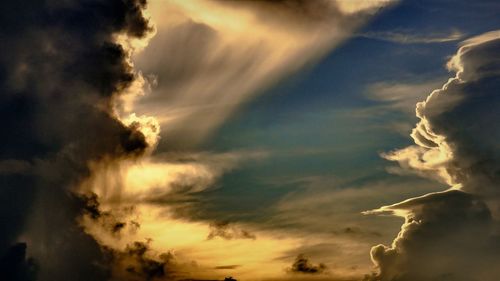 Low angle view of clouds in sky during sunset