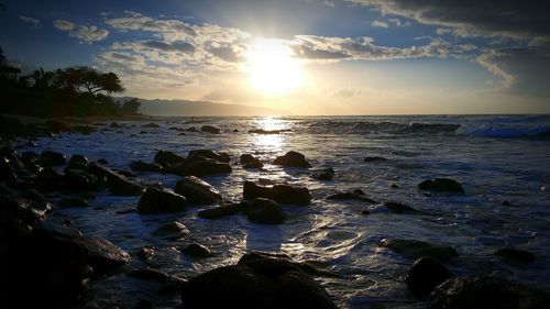 Scenic view of sea at sunset