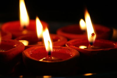 Close-up of candles burning candle