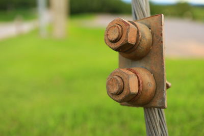 Close-up of rusty metallic structure in park