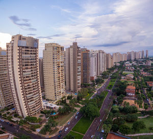 High angle view of buildings in city against sky