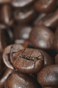 Close-up of coffee beans on table