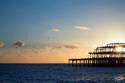 Scenic view of sea at sunset