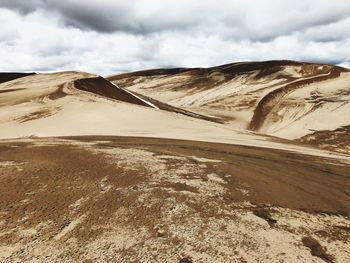 Scenic view of desert against sky