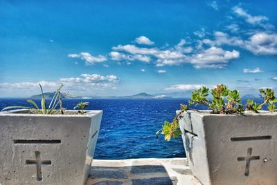 Scenic view of sea against blue sky