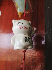 Close-up of smiley face on wood