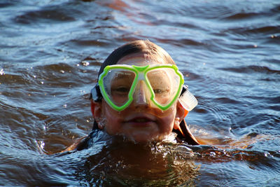 Portrait of man swimming in sea