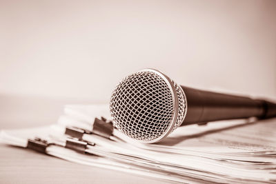 Close-up of microphone on table