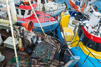 Boats moored at harbor