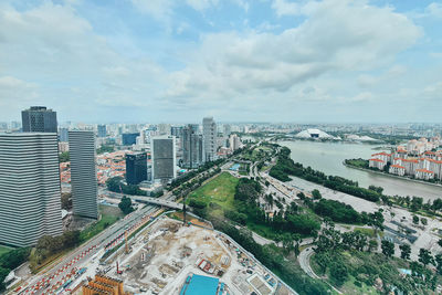 High angle view of buildings in city against sky