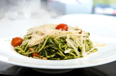 Close-up of pasta in plate on table