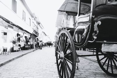 Close-up of motorcycle on street