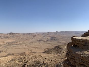 Scenic view of desert against clear sky