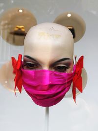 Close-up portrait of mannequin on table