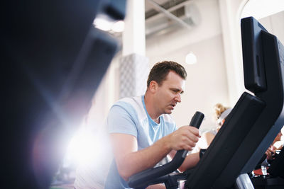 Man exercising at gym