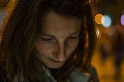 Close-up of woman looking down