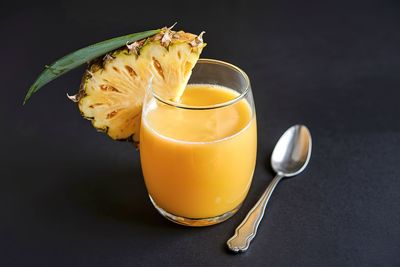 High angle view of drink in glass against black background