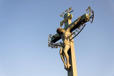 Low angle view of statue against clear sky