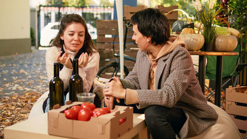 Portrait of young woman preparing food