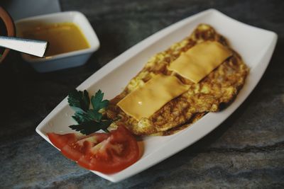 Close-up of breakfast served on table