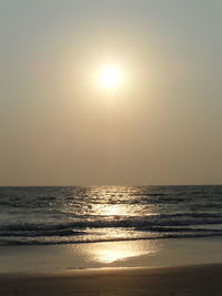 Scenic view of sea against sky at sunset