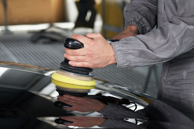 Close-up of man preparing food