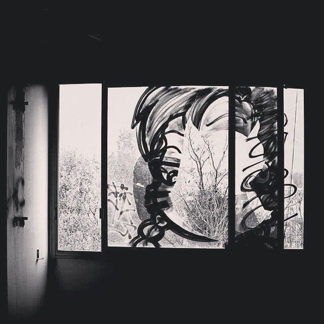 indoors, window, wall - building feature, built structure, architecture, home interior, wall, art, design, glass - material, railing, no people, metal, house, pattern, graffiti, sunlight, day, creativity, closed