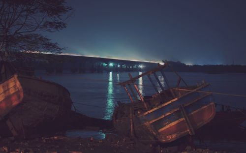 Scenic view of sea against sky at night